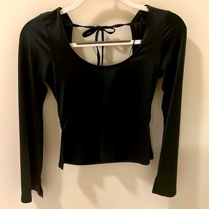 Top shop black long sleeve blouse size 2. Perfect for a night out. Never worn.